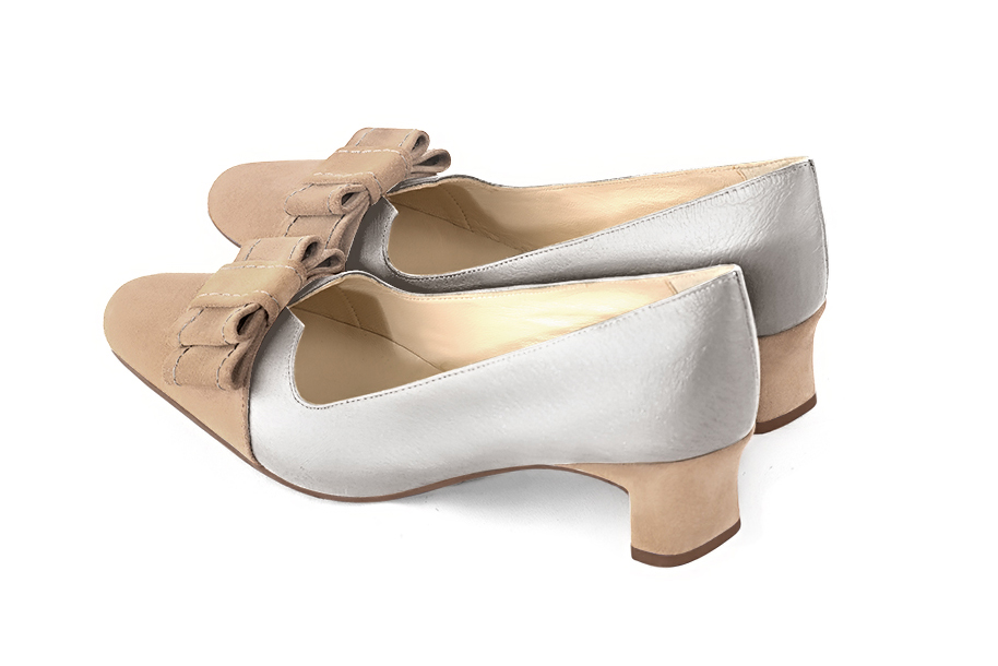 French elegance and refinement for these biscuit beige and light silver dress pumps, with a knot on the front, 
                available in many subtle leather and colour combinations. Possibility to customize with your colors, materials and heels.
With its original cutout, this pretty fitted pump
will render you great services, combining comfort and distinction. 
                Matching clutches for parties, ceremonies and weddings.   
                You can customize these shoes to perfectly match your tastes or needs, and have a unique model.  
                Choice of leathers, colours, knots and heels. 
                Wide range of materials and shades carefully chosen.  
                Rich collection of flat, low, mid and high heels.  
                Small and large shoe sizes - Florence KOOIJMAN
